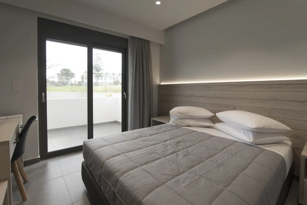 Bedroom with the balcony door open