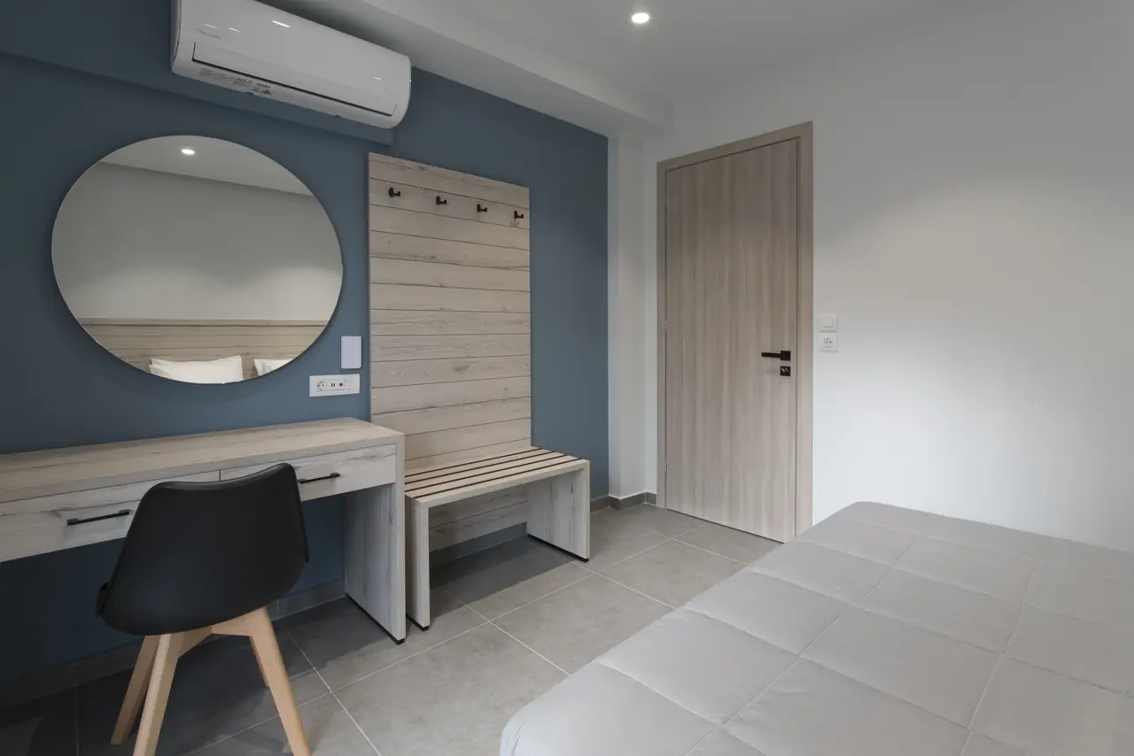 Bedroom desk with round mirror