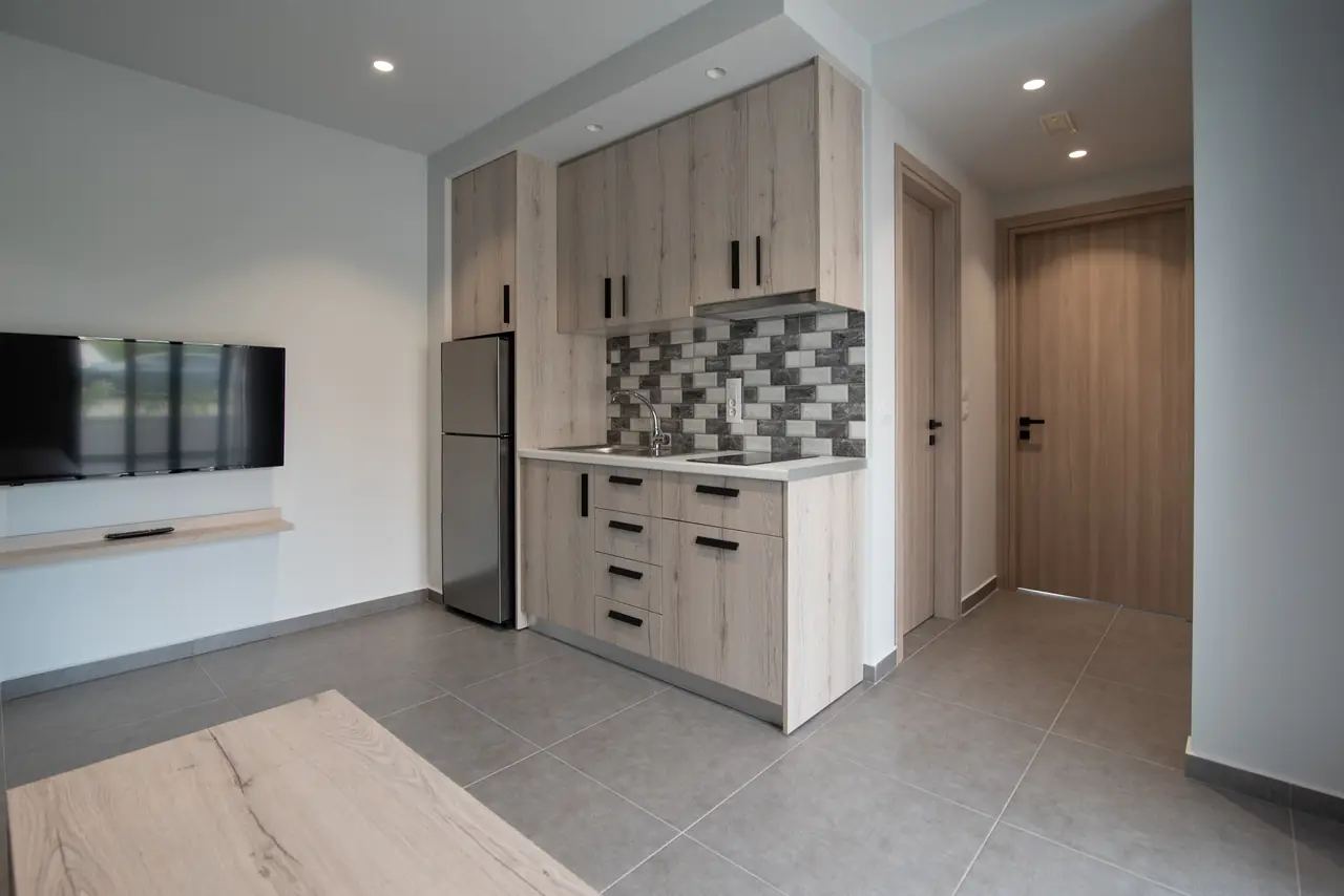 Wall TV and kitchenette